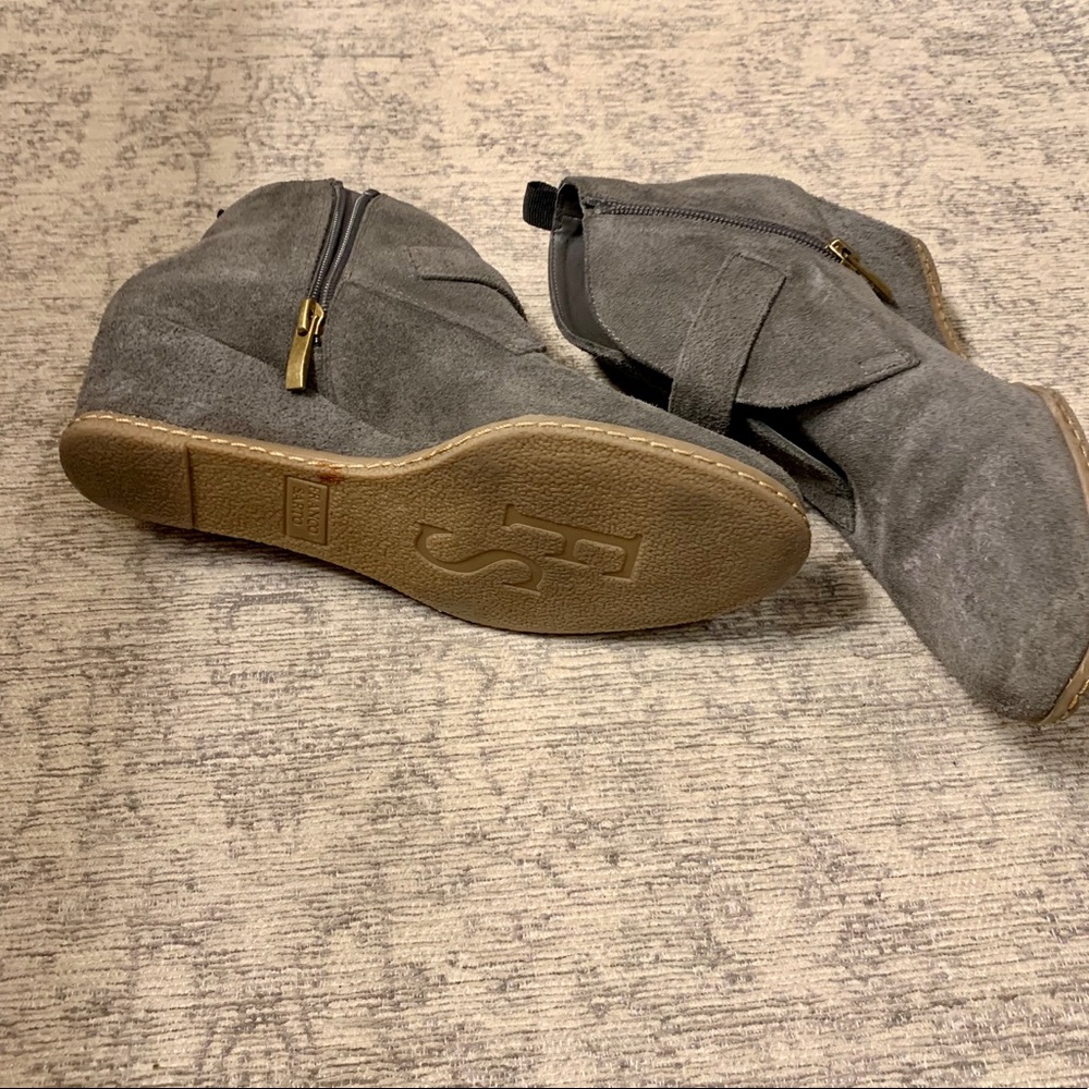 Zip side, gray bootie with wedge heal.